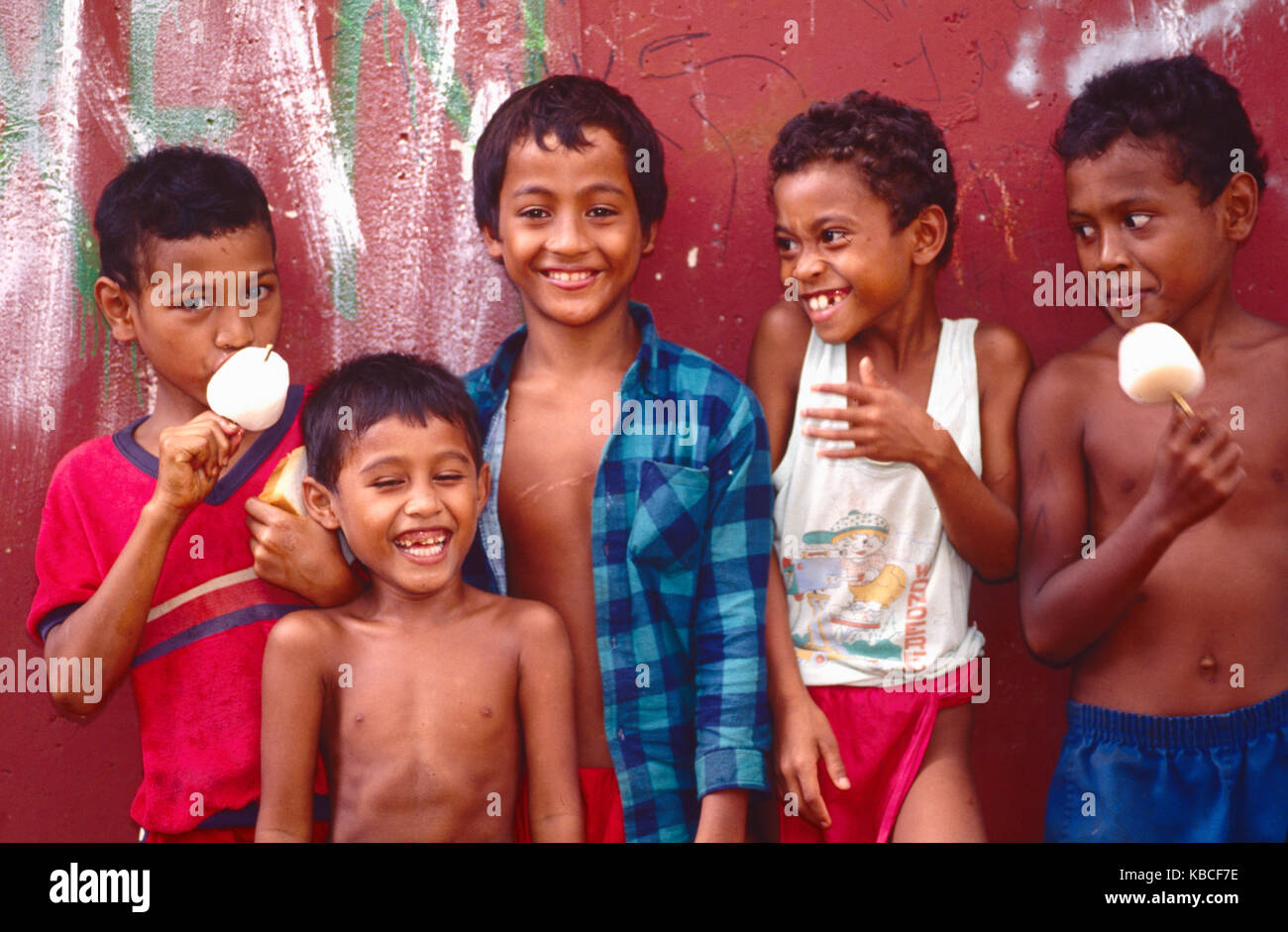 Gagil school, Native children, Yap, Wa`ab, Waqab, Federated States of Micronesia, islands in the Caroline Islands, laughing, eating, playing at recess Stock Photo